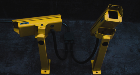 Two yellow cameras facing outwards