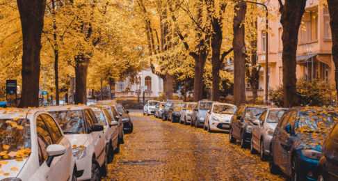 Cars pavement parking on a small street