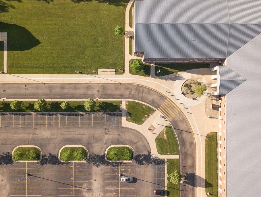 Aerial view of an empty school parking lot