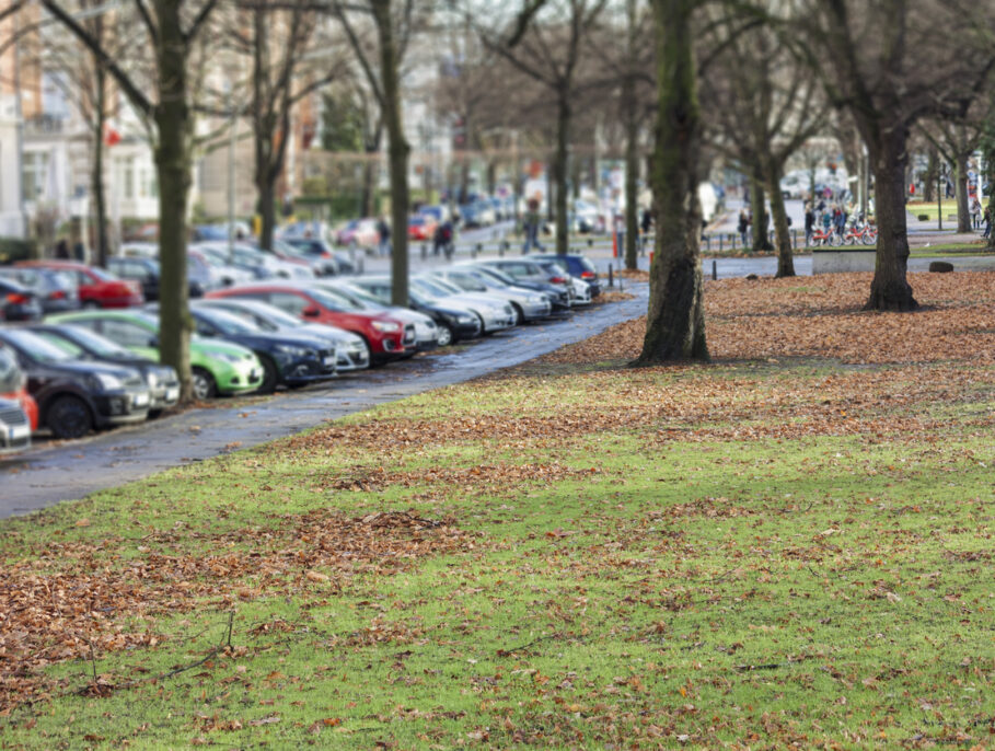 Blurry image of cars parked in a parking lot