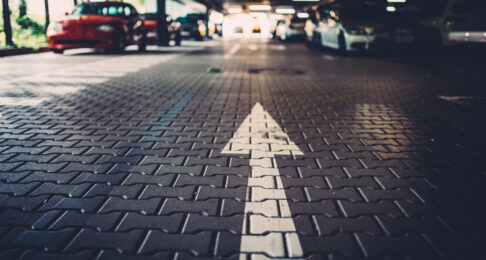 Car park with a one-way arrow on the ground