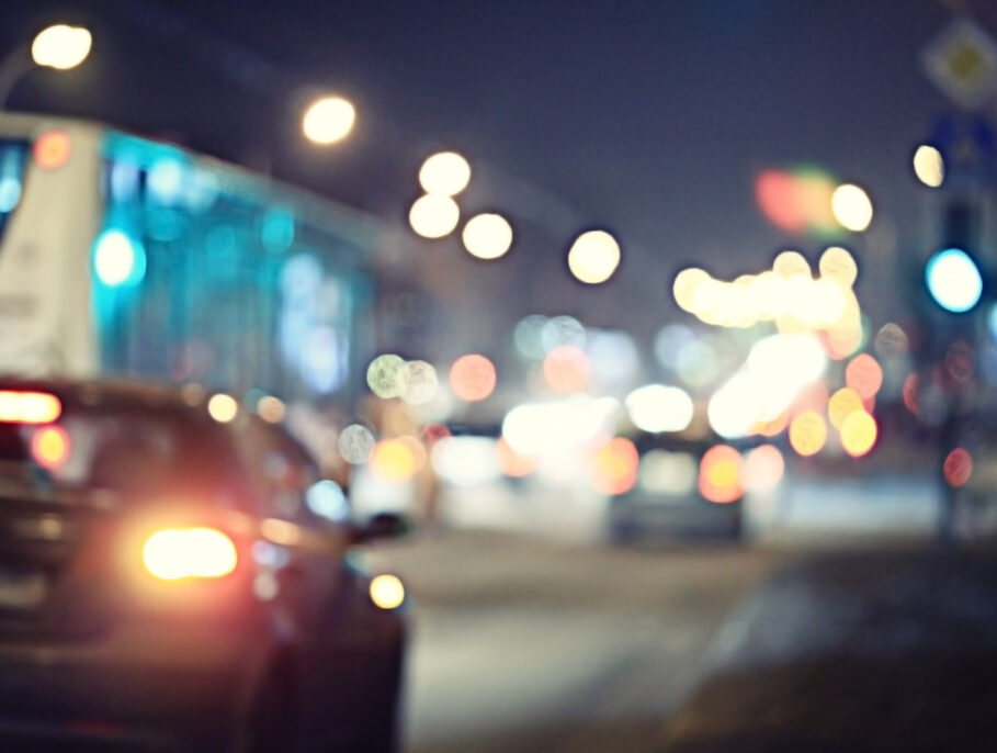 Blurred view of cars driving down the road