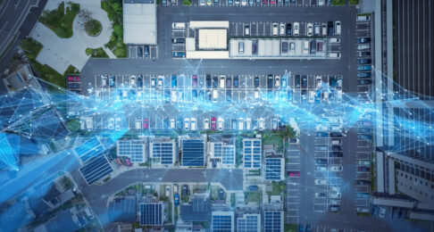 A busy car park with a mockup of fibreoptic anpr data lines swirling over it.