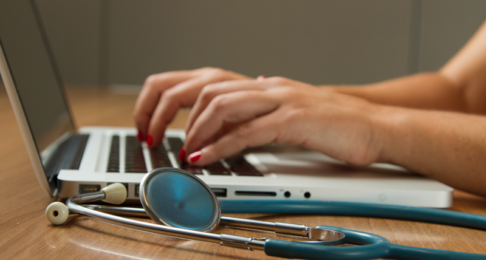 Nurse working at a computer