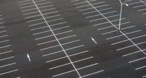 An empty car park, with lined spaces