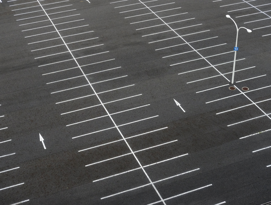 An empty car park, with lined spaces