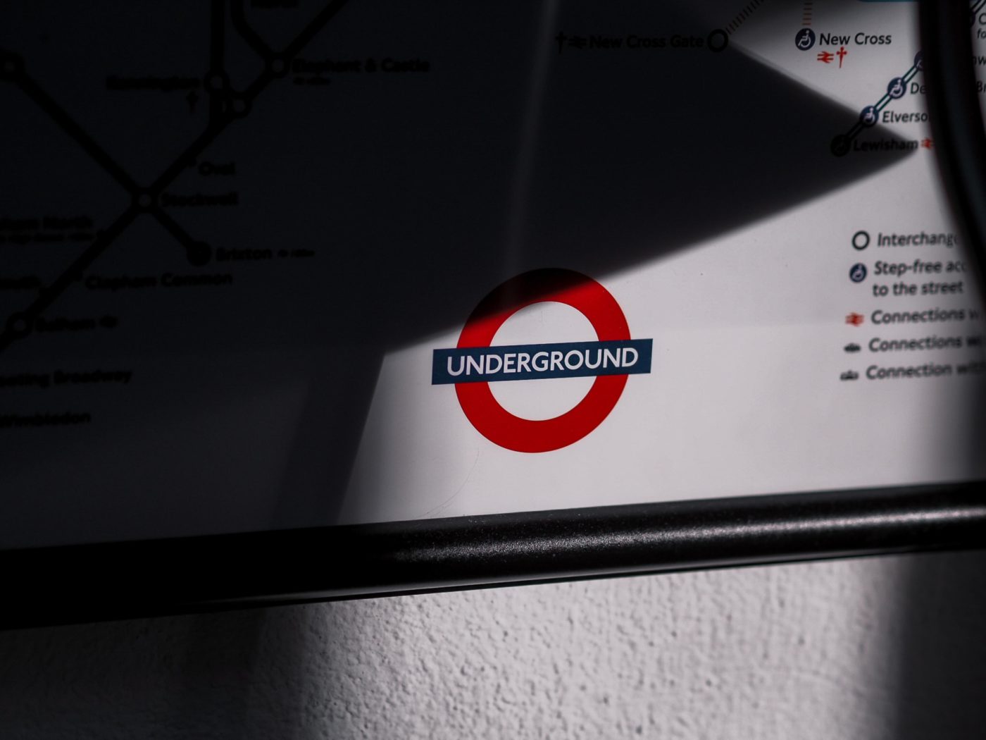 London underground logo with a shadow cast over it