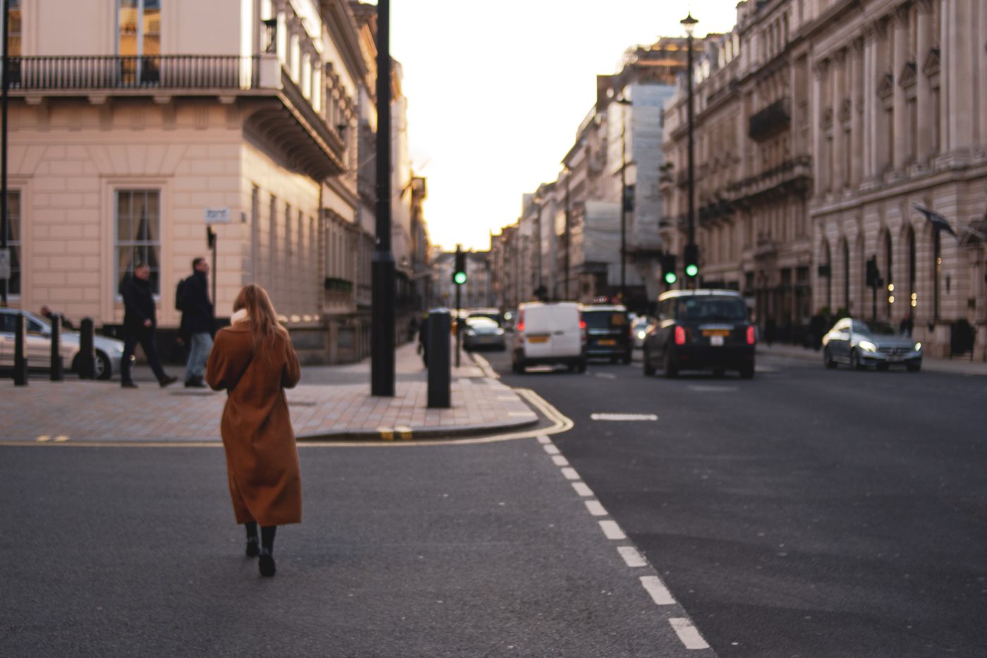 Woman crossing the street in London