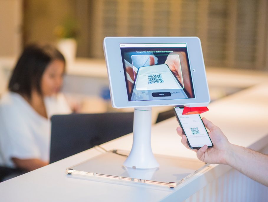 Man using QR code to pay at a hotel
