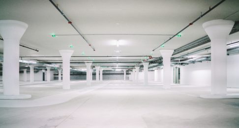 A white underground car park without any cars