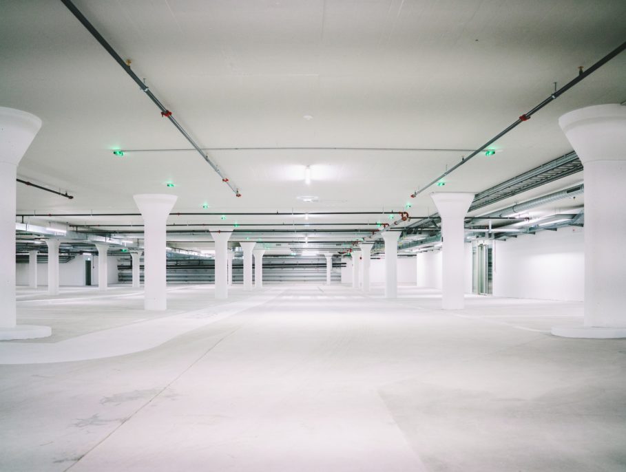 A white underground car park without any cars