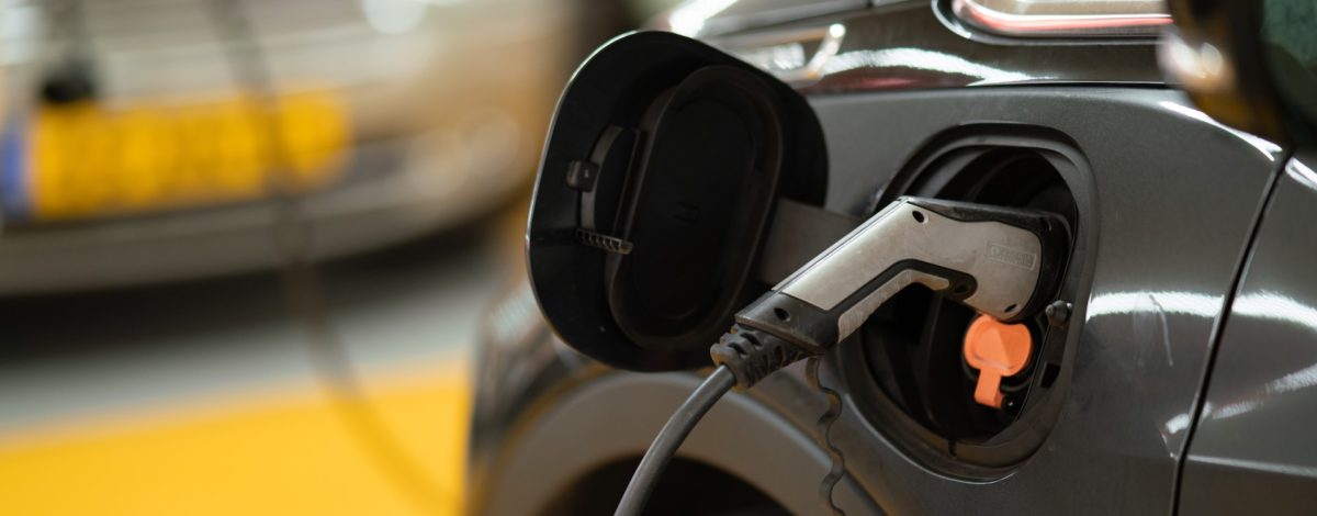 Electric car charging in car park