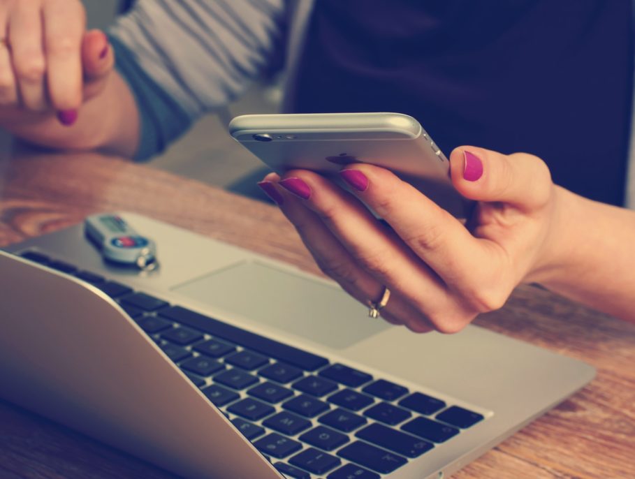 woman working with phone in hand