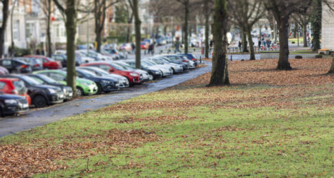 Blurry image of cars parked in a parking lot