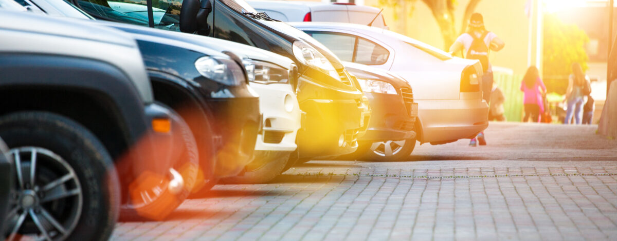 Multiple cars parked on a car park