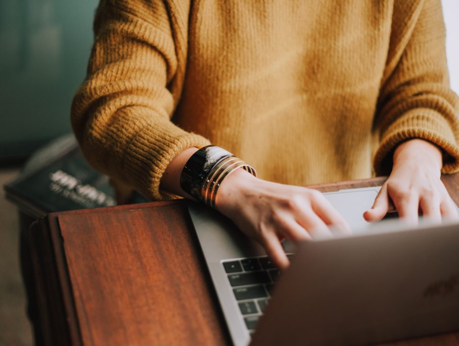 Woman using a laptop at a desk